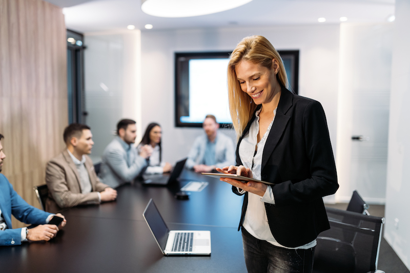 Young women in the office investigating Anonymization and Pseudonymization solutions
